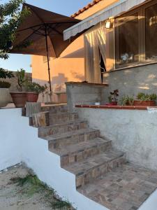 a set of stairs in front of a house at Casa vacanze in Ottava Sassari
