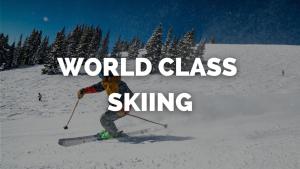 a person on skis in the snow with words world class skiing at Basement Guest Suite With A Pool Table A Hot Tub And A TV in Denver +15 photos