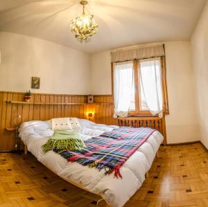 Ένα ή περισσότερα κρεβάτια σε δωμάτιο στο Villa Aurora