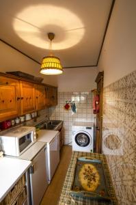 Η κουζίνα ή μικρή κουζίνα στο Villa Aurora +4 φωτογραφίες