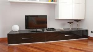 a black entertainment center with a flat screen tv on it at Italianway-Dogana in Milan