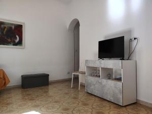 A television and/or entertainment centre at MY SWEET HOME - SIRACUSA