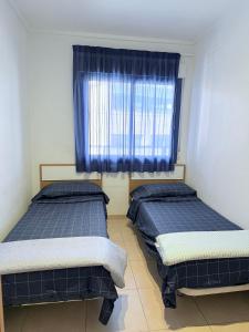 Ένα ή περισσότερα κρεβάτια σε δωμάτιο στο Alicante Hills 1 +17 φωτογραφίες