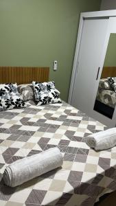 Postel nebo postele na pokoji v ubytování Aconchegante Apartamento em Goiânia + 9 fotografií