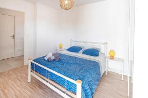 Ένα ή περισσότερα κρεβάτια σε δωμάτιο στο Imarena, Elegance et Vue Port