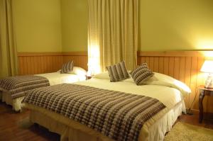 Letto o letti in una camera di Hotel San Giorgio