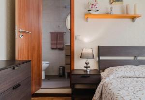 Cama o camas de una habitación en Quarto duplo com wc privada Apúlia