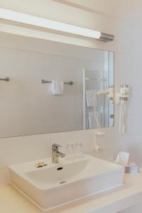 Kúpeľňa v ubytovaní Hotel Sporer