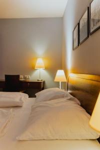 Posteľ alebo postele v izbe v ubytovaní Hotel Sporer
