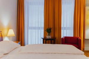Posteľ alebo postele v izbe v ubytovaní Hotel Sporer