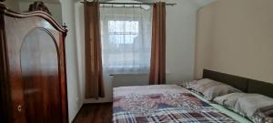 Letto o letti in una camera di Statek Kloubek