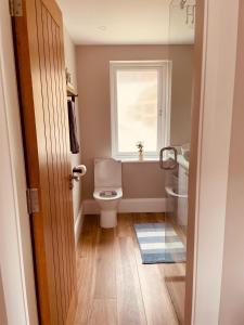 Bagno di Teach Máire, Downings