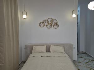 Posteľ alebo postele v izbe v ubytovaní Downtown Apartments