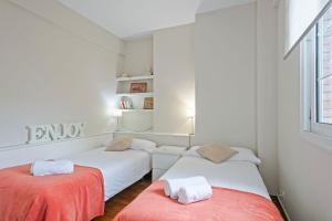 Postel nebo postele na pokoji v ubytování Sarria Attic