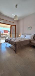 Posteľ alebo postele v izbe v ubytovaní P.A.G Apartments