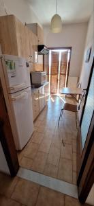 Kuchyňa alebo kuchynka v ubytovaní P.A.G Apartments