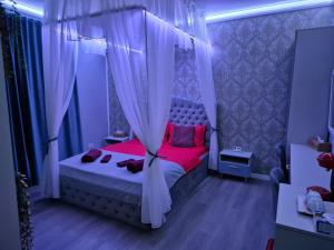 Postel nebo postele na pokoji v ubytování AFI Discret Jacuzzi