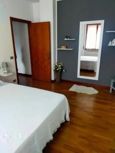 Ένα ή περισσότερα κρεβάτια σε δωμάτιο στο Casa a Villa