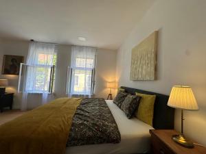 Posteľ alebo postele v izbe v ubytovaní Pelso Luxury Apartments