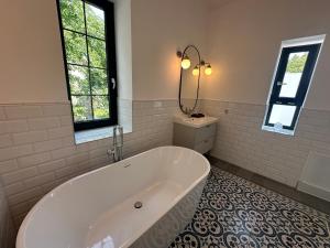 Kúpeľňa v ubytovaní Pelso Luxury Apartments