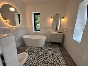 Kúpeľňa v ubytovaní Pelso Luxury Apartments