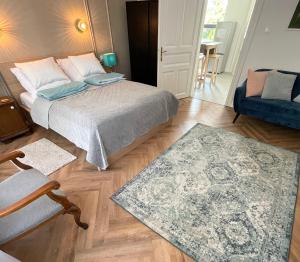 Posteľ alebo postele v izbe v ubytovaní Pelso Luxury Apartments