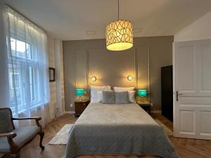 Posteľ alebo postele v izbe v ubytovaní Pelso Luxury Apartments