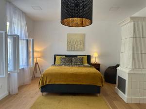 Posteľ alebo postele v izbe v ubytovaní Pelso Luxury Apartments