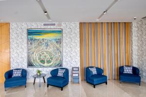 Un lugar para sentarse en Hotel Velvet Plaza