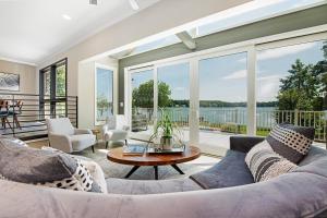 a living room with a couch and a table at Ringneck Retreat in Mooresville