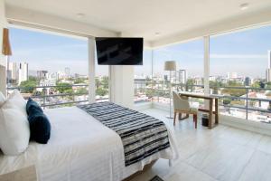 Una cama o camas en una habitación de Hotel Velvet Plaza