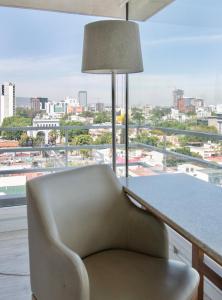 Un lugar para sentarse en Hotel Velvet Plaza