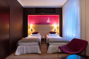 Posteľ alebo postele v izbe v ubytovaní Hotel Cristal Białystok