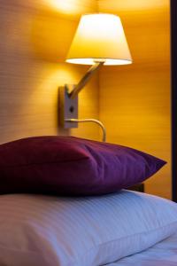 Posteľ alebo postele v izbe v ubytovaní Hotel Cristal Białystok