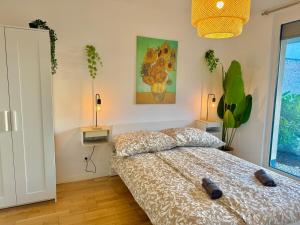 Ένα ή περισσότερα κρεβάτια σε δωμάτιο στο Premium Apartment mit Garten nähe SCS