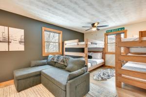 a living room with a couch and bunk beds at Fish, Hike and Ski Spacious Family Escape in Eden in Eden