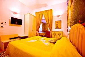 Postel nebo postele na pokoji v ubytování Residenza Sole Amalfi