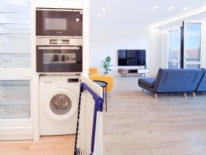 A kitchen or kitchenette at AKURA apartment, con aire acondicionado