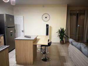 Una cocina o zona de cocina en Cosy and modern flat in Mauritius