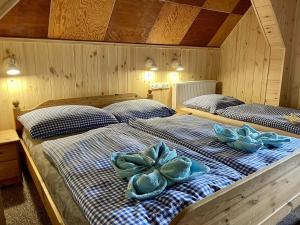 Postel nebo postele na pokoji v ubytování Chata Severka s Wellness