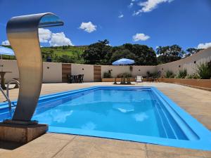 Der Swimmingpool an oder in der Nähe von Pousada Pitauá