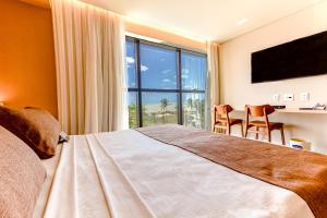 Cama ou camas em um quarto em Littoral Express