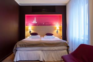 Posteľ alebo postele v izbe v ubytovaní Hotel Cristal Białystok