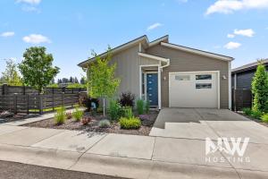 a house with a driveway and a fence at RSD 3040 in Coeur d'Alene