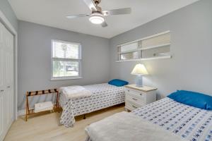 Ένα ή περισσότερα κρεβάτια σε δωμάτιο στο Lanai, Grill and Outdoor Pool Melbourne Duplex! +25 φωτογραφίες