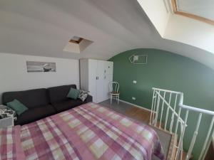 En eller flere senge i et værelse på Fronte Mare 23 Civitanova Marche