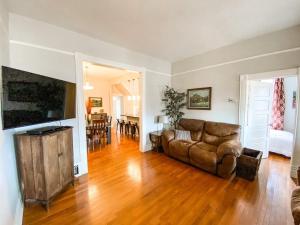 a living room with a couch and a table at New Remodel in upscale neighborhood in Colorado Springs