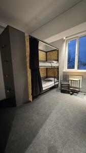 Postel nebo postele na pokoji v ubytování Лучший Хостел Алматы - Саяхат