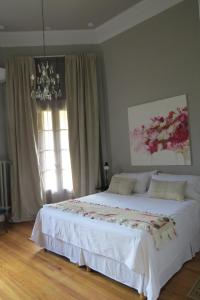 Ένα ή περισσότερα κρεβάτια σε δωμάτιο στο Elena Hotel Boutique