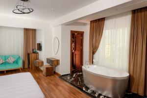 Ένα ή περισσότερα κρεβάτια σε δωμάτιο στο La Veranda Pyramids Boutique Hotel With Rooftop Access